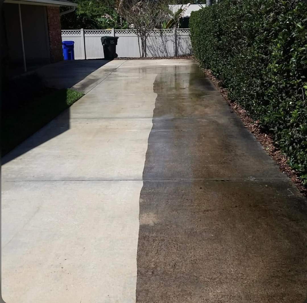 Freshly pressure-cleaned paver driveway in Palm Beach