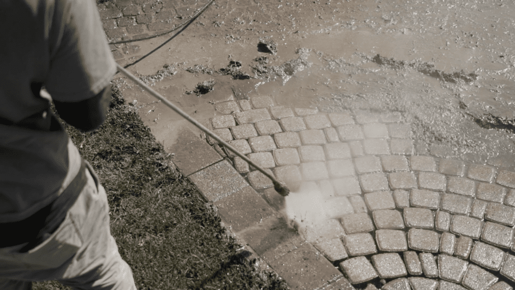 Freshly cleaned and sealed paver driveway at a Florida estate