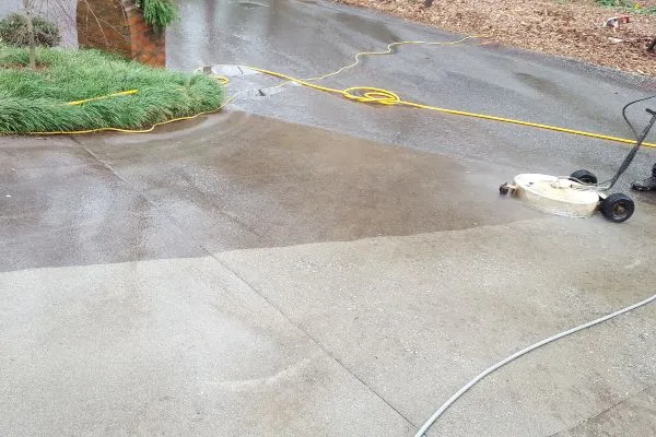 Illustrative driveway sidewalk pressure cleaning service imagery