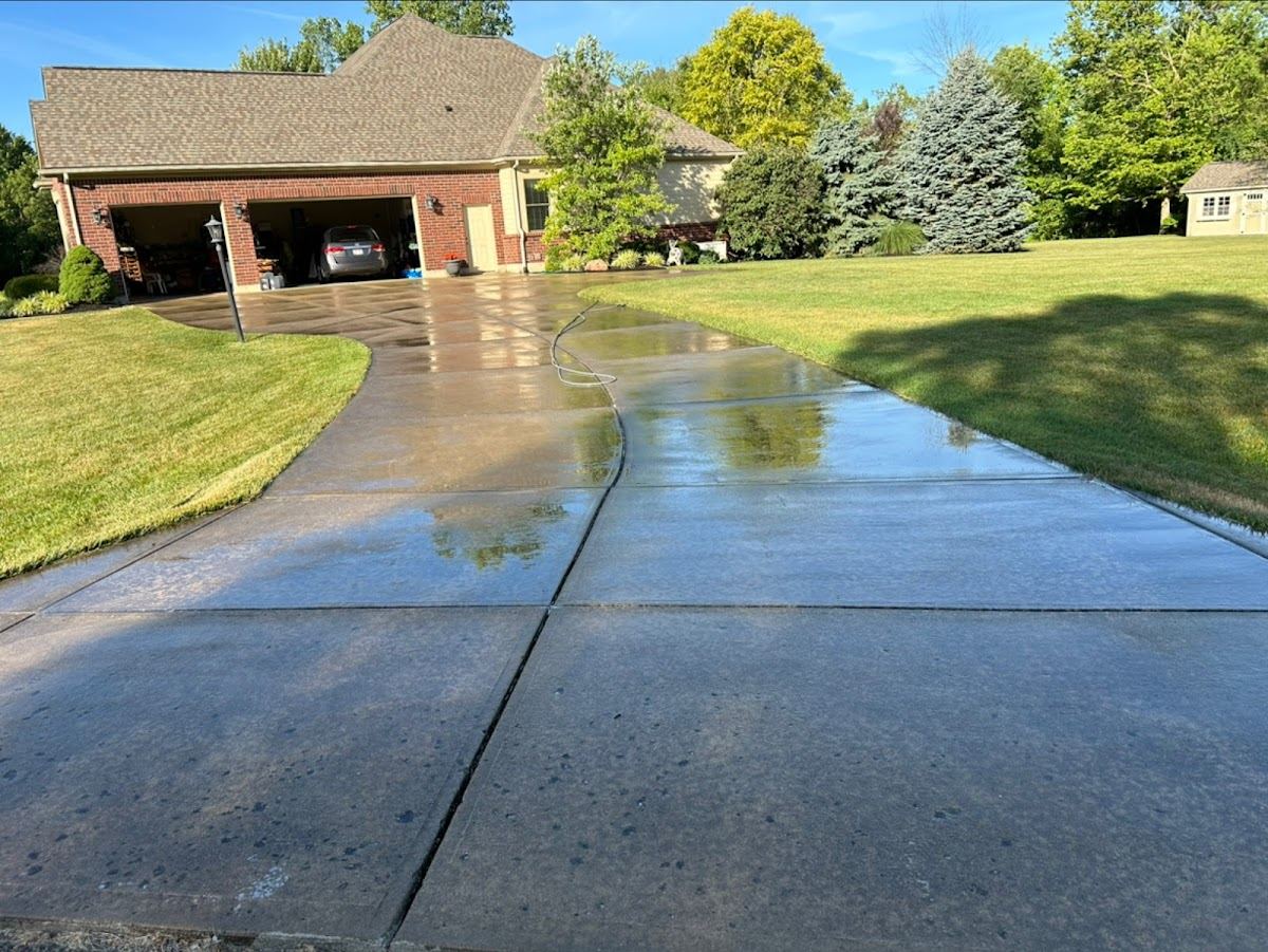 Illustrative driveway sidewalk pressure cleaning service imagery